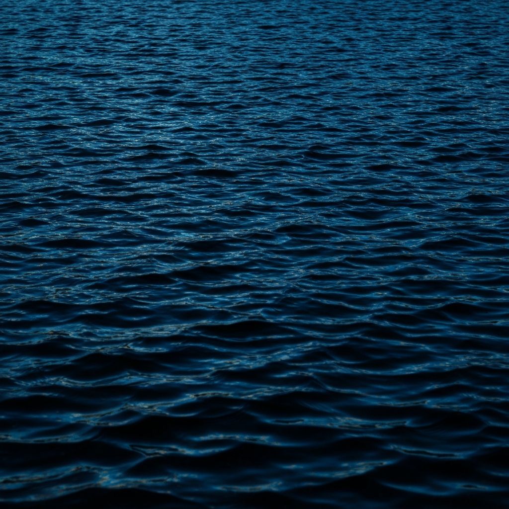 Abstract water surface with subtle blue reflections